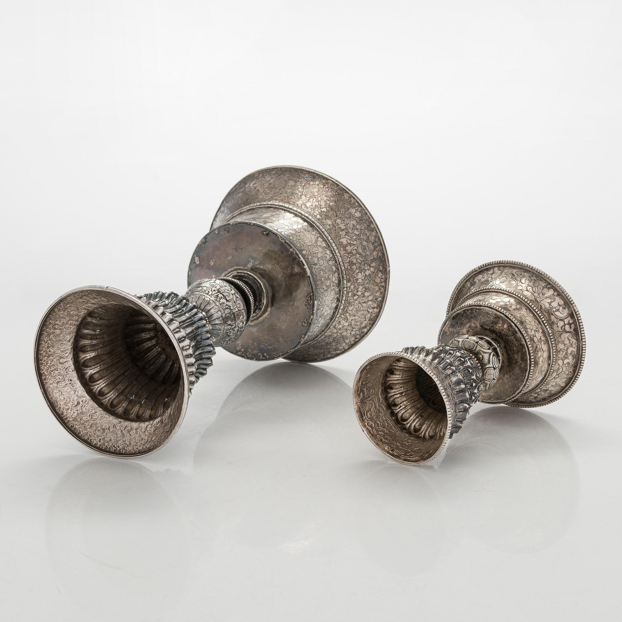 Two silver butter lamps, Tibet, 19th century.