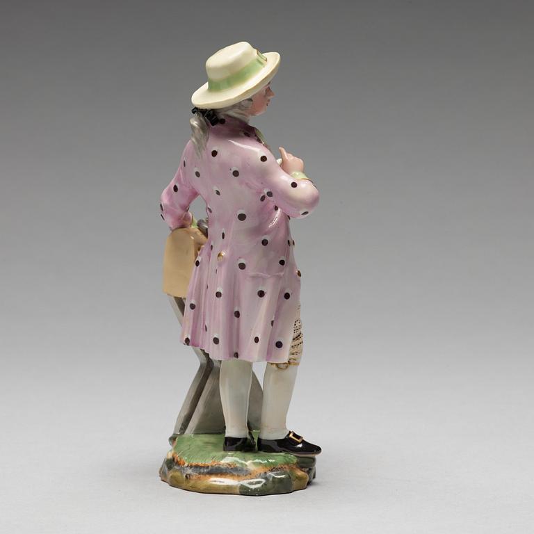 A porcelain figure of a man by the letterbox, "Höchst mark", circa 1900.