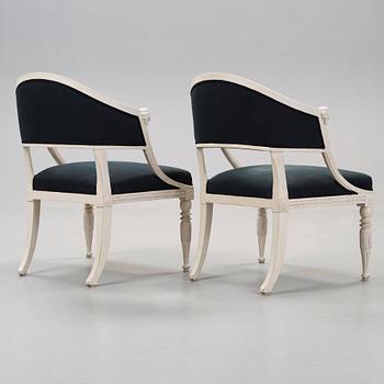 A pair of late Gustavian early 19th century armchairs.