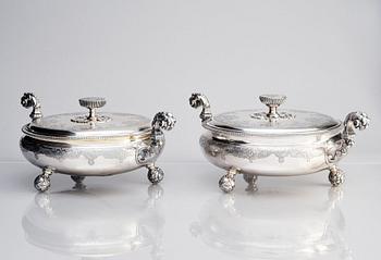 A pair of Swedish parcel-gilt silver bowls with covers, mark of S.A.Ackland, 1953 and 1963.