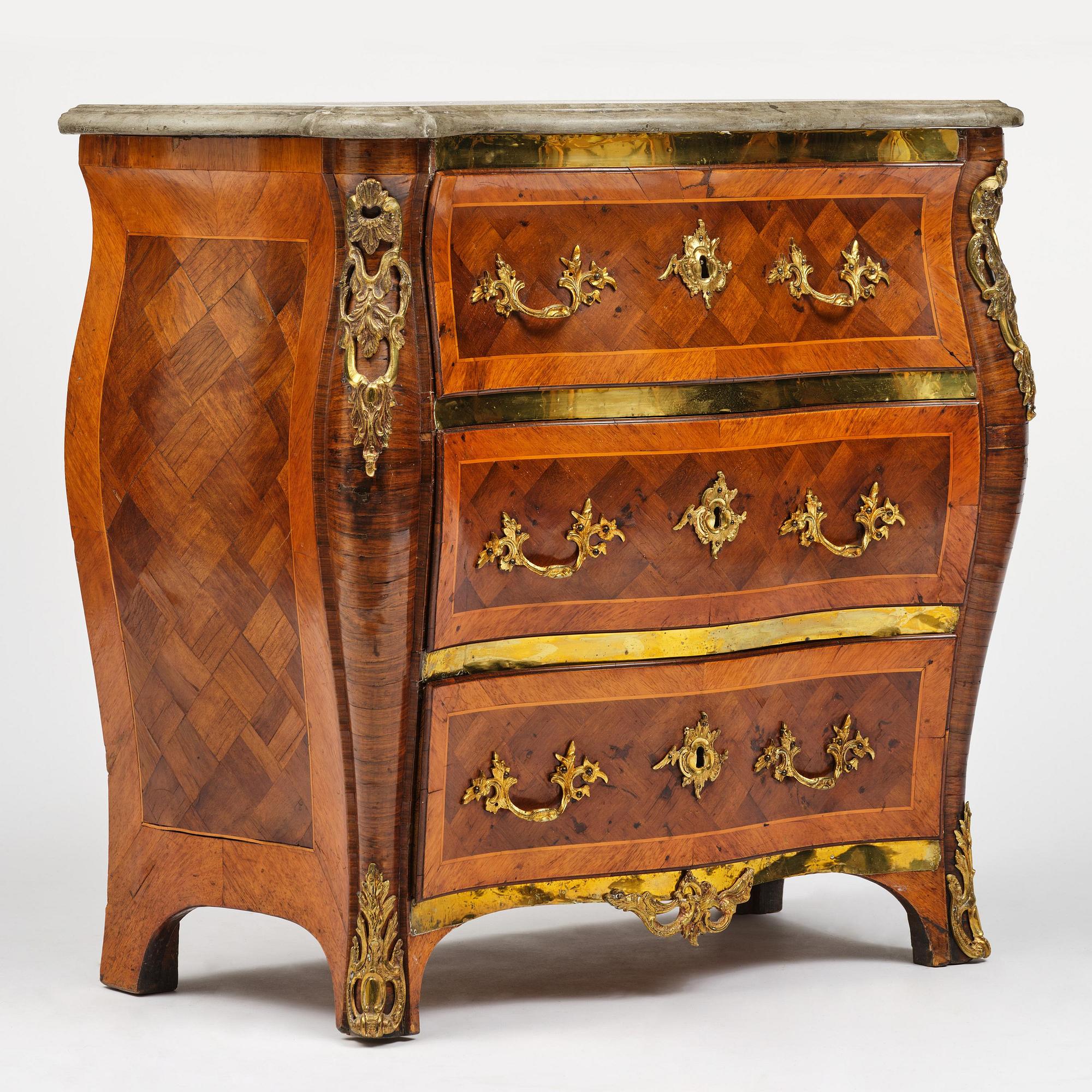 A rococo parquetry commode by C. Linning (master in Stockholm 1744-79).