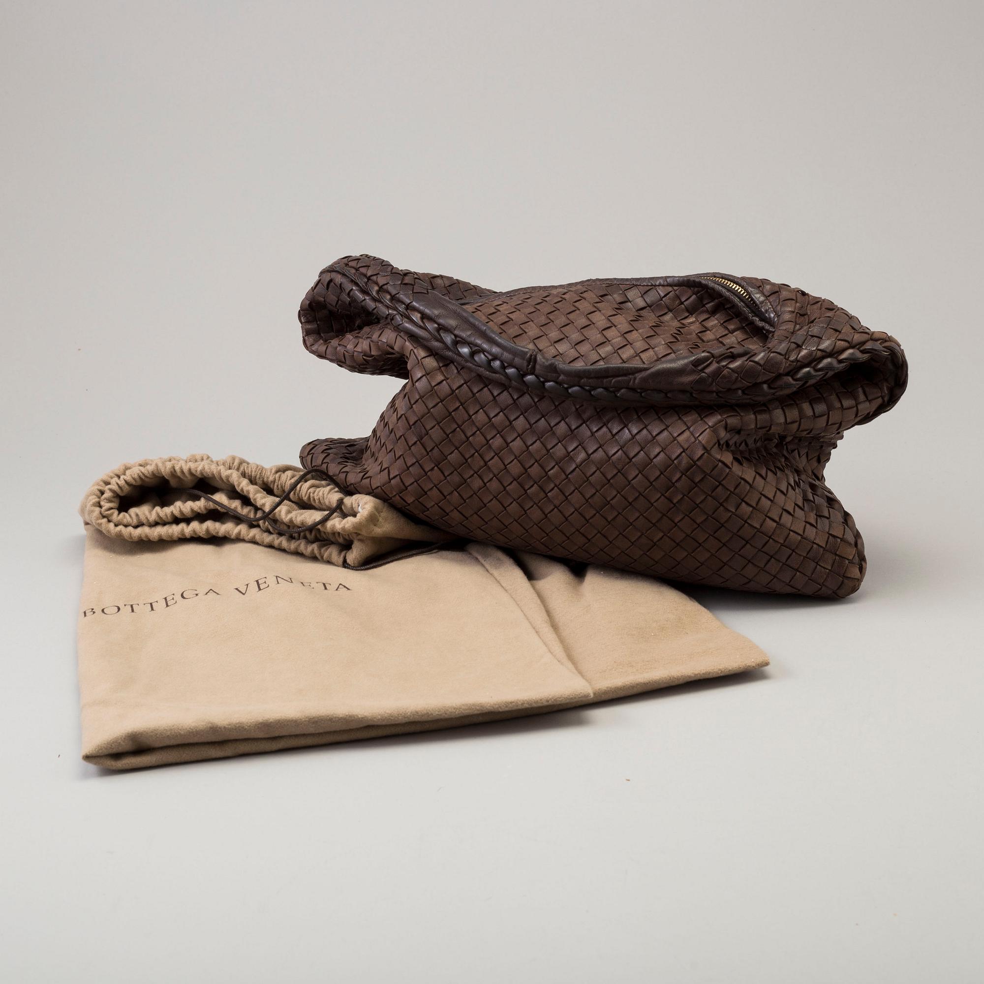 a 'Hobo' Bottega Veneta bag, with mirror.