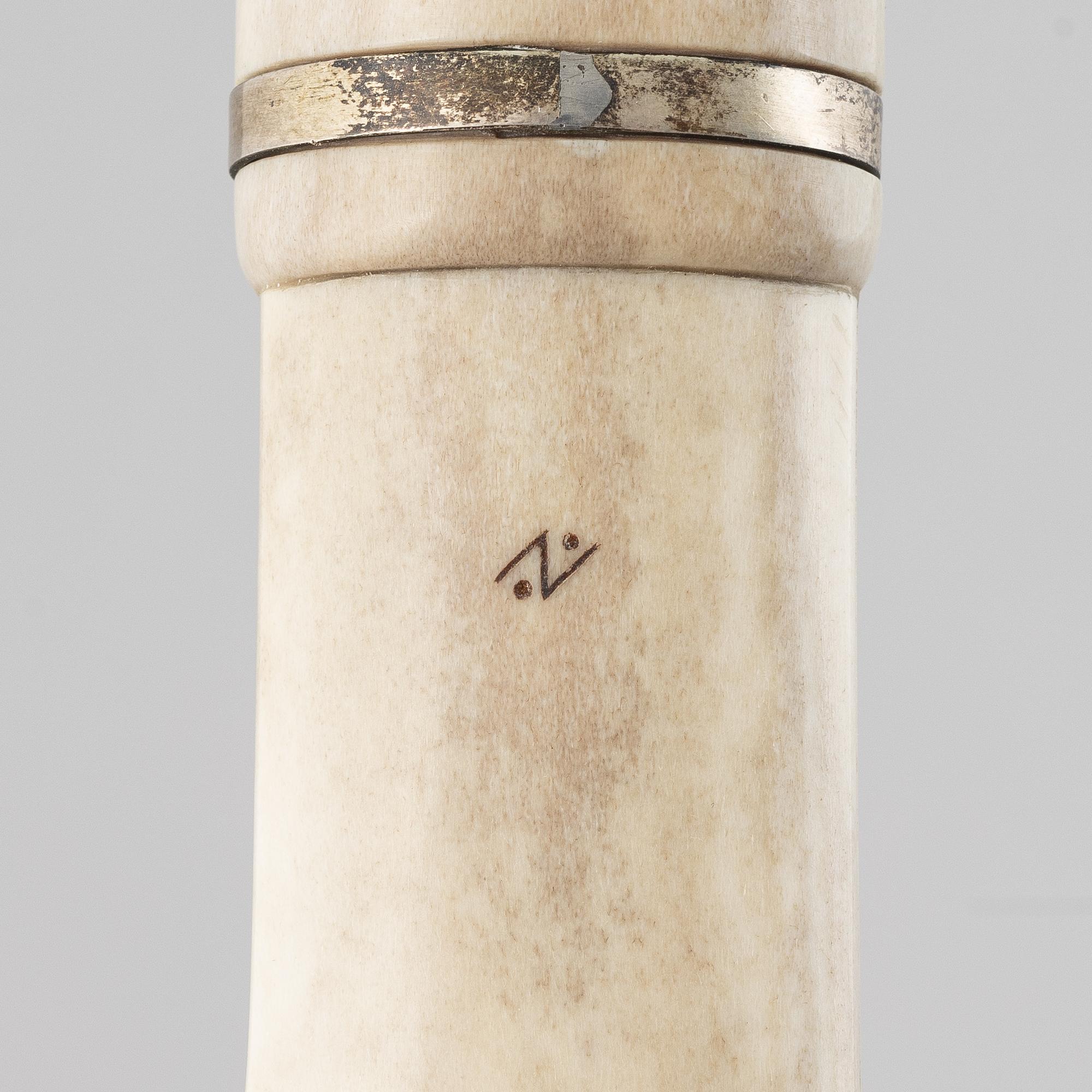 A reindeer horn knife.