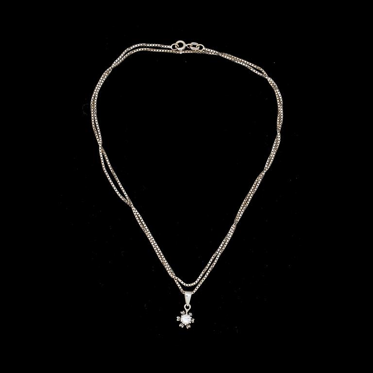 HÄNGE MED HALSKEDJA, 18 k vitgild med briljantslipad diamant ca 0,35 ct. Vikt ca 6 g.