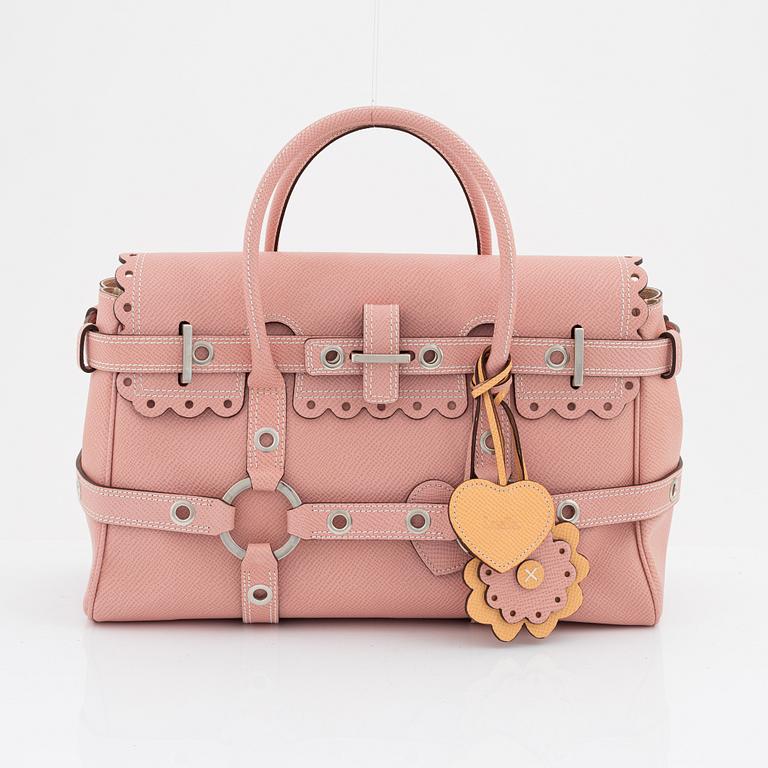 Luella Bartley, a pink leather 'Scallop Gisele' handbag.