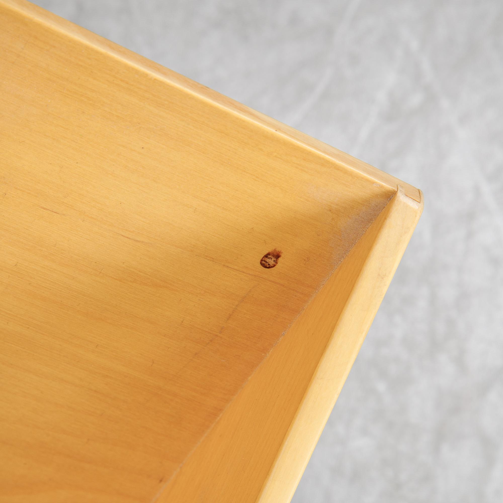 A model T 709 book stand by Bruno Mathsson for Firma Karl Mathsson, dated 1967.