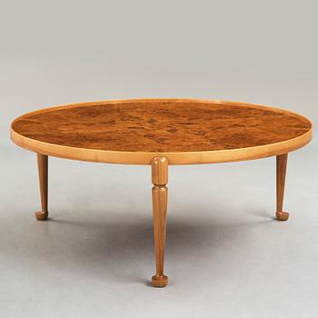 Josef Frank, a burrwood and walnut sofa table, Svenskt Tenn, Sweden, model 2139, executed before 1985.