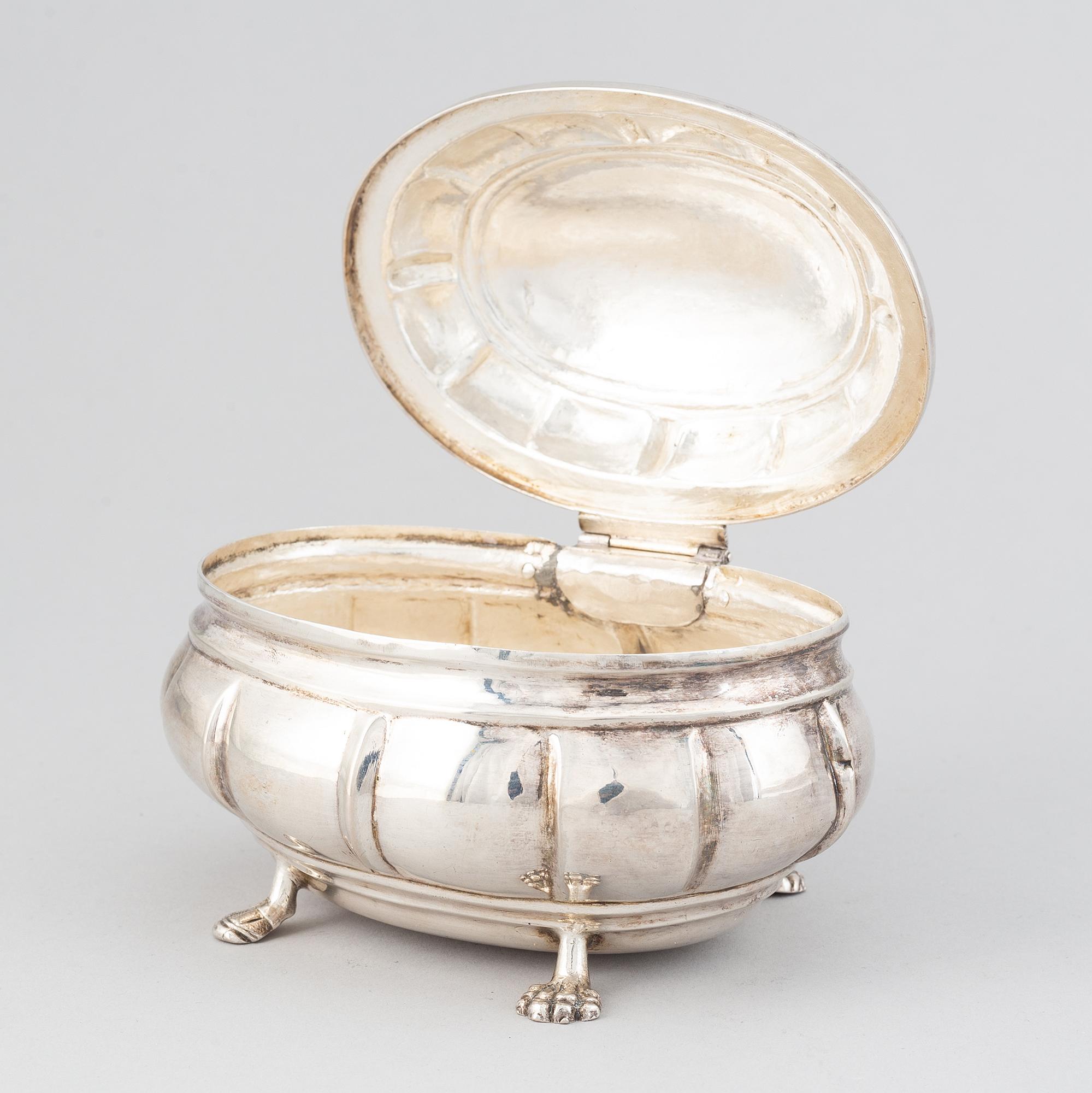 A late baroque silver sugar box, circa 1750, probably Germany.