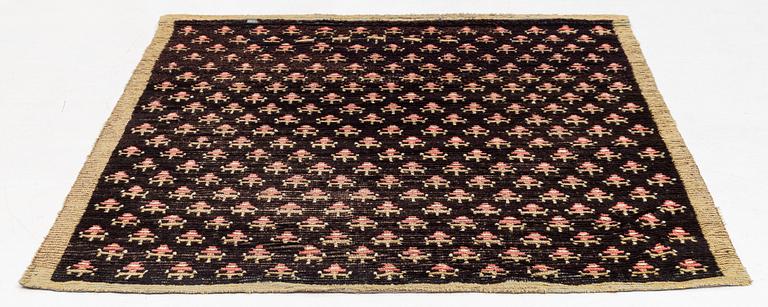 A knotted pile rug, Sweden/Finland, 18th/19th Century, c. 190 x 158 cm.
