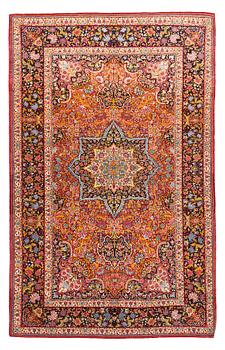 307. A rug, semi-antique Mashad, ca 224 x 141,5 cm.