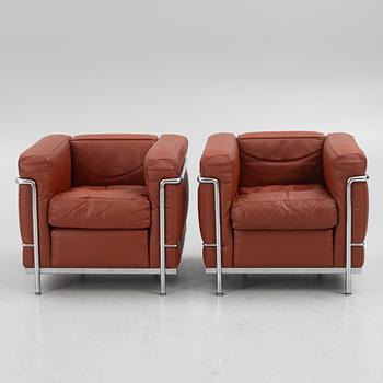 Le Corbusier, Pierre Jeanneret & Charlotte Perriand, a pair of "LC2" armchairs, Cassina, Italy.