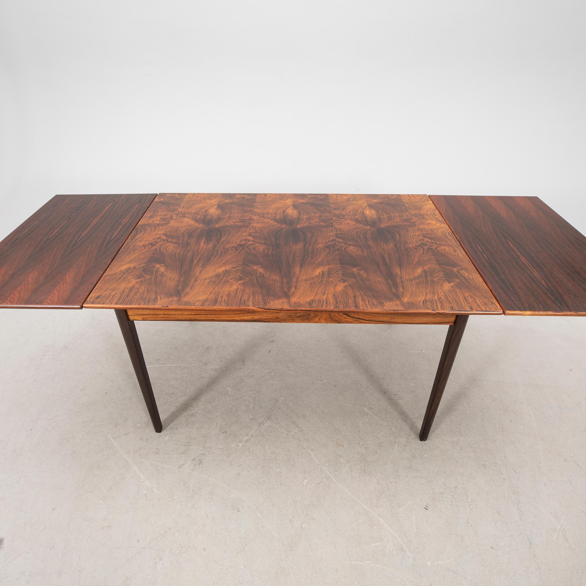 A 1960s jacaranda dining table.