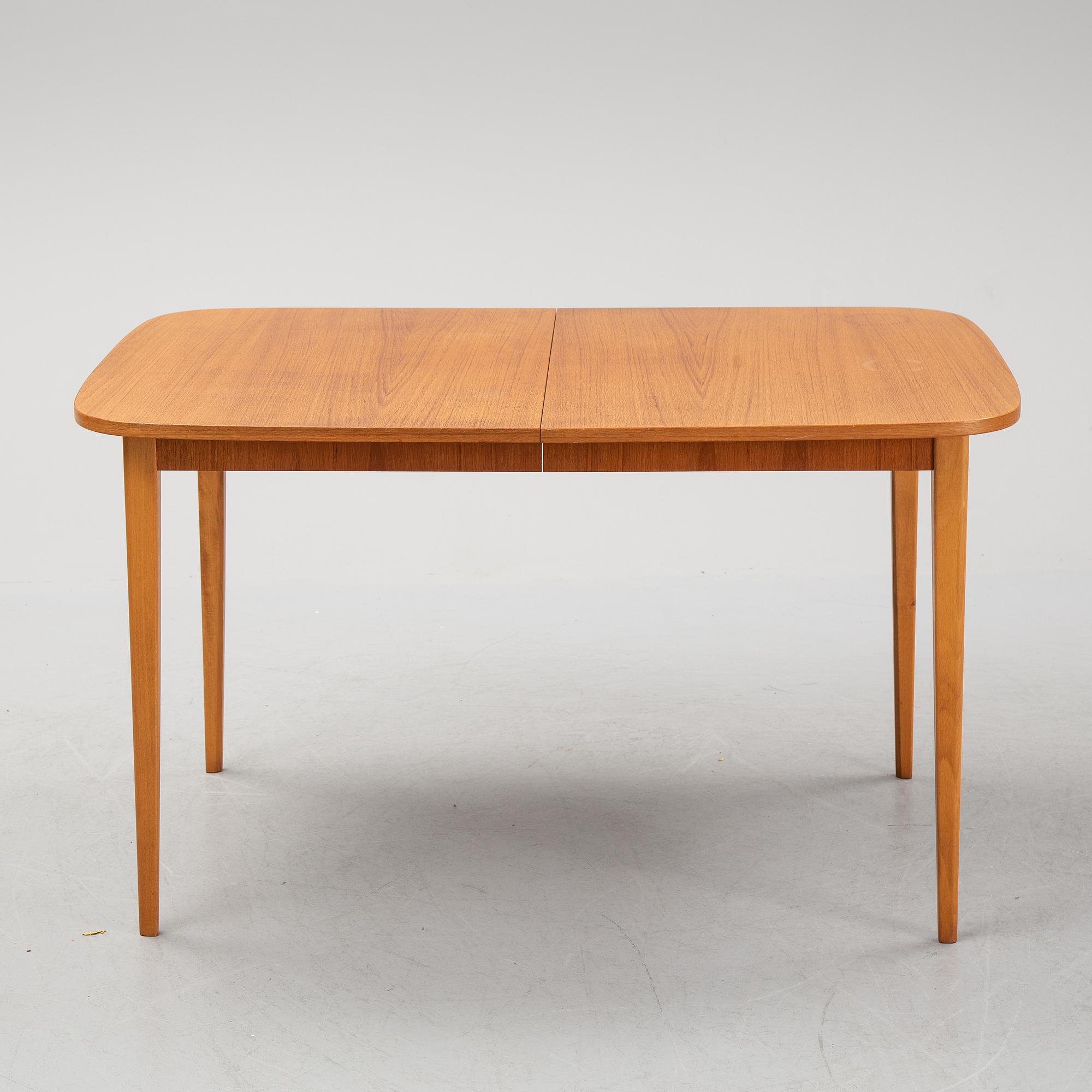 a 1950's/60's teak dining table.