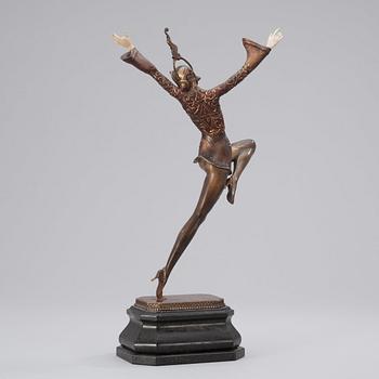 A Gustav Schmidt-Cassel gilt and cold painted bronze and ivory Art Deco figure of an 'Eastern dancer'.