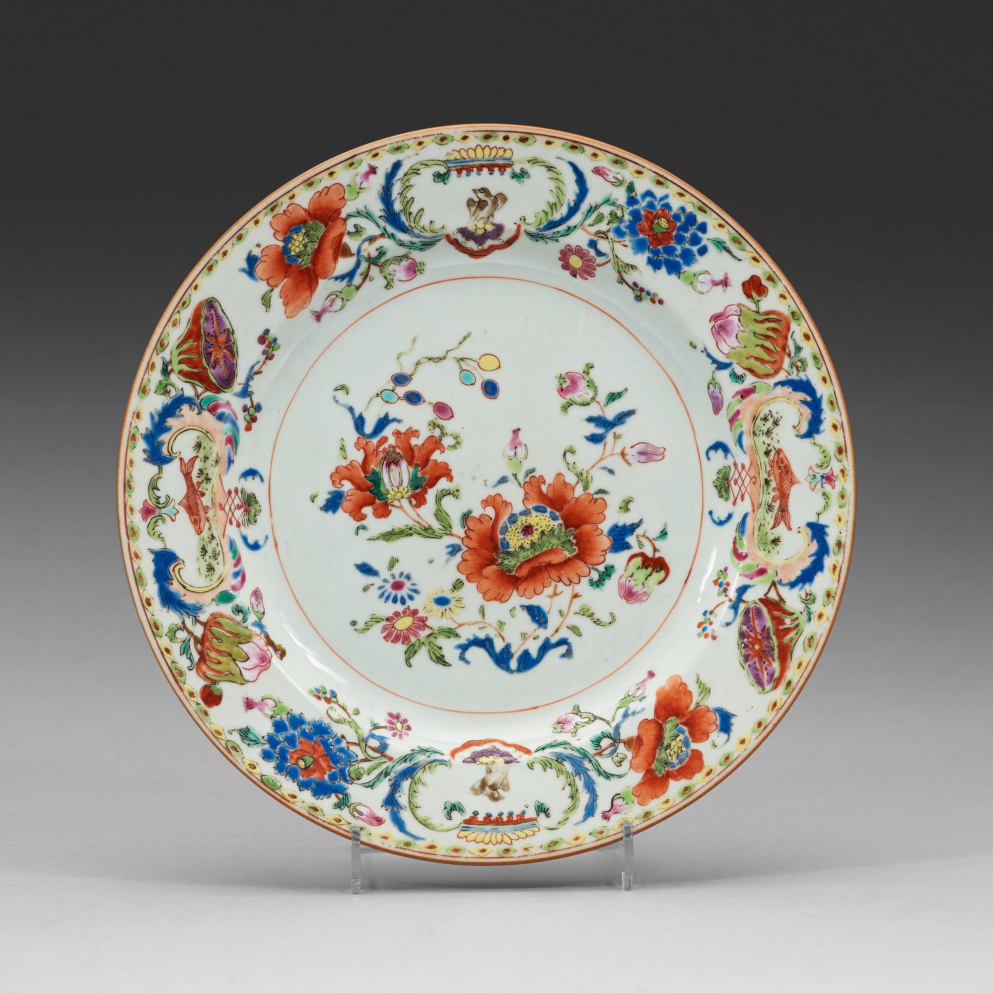 An export porcelain 'Pompadour' armorial plate, Qing Dynasty, circa 1745.