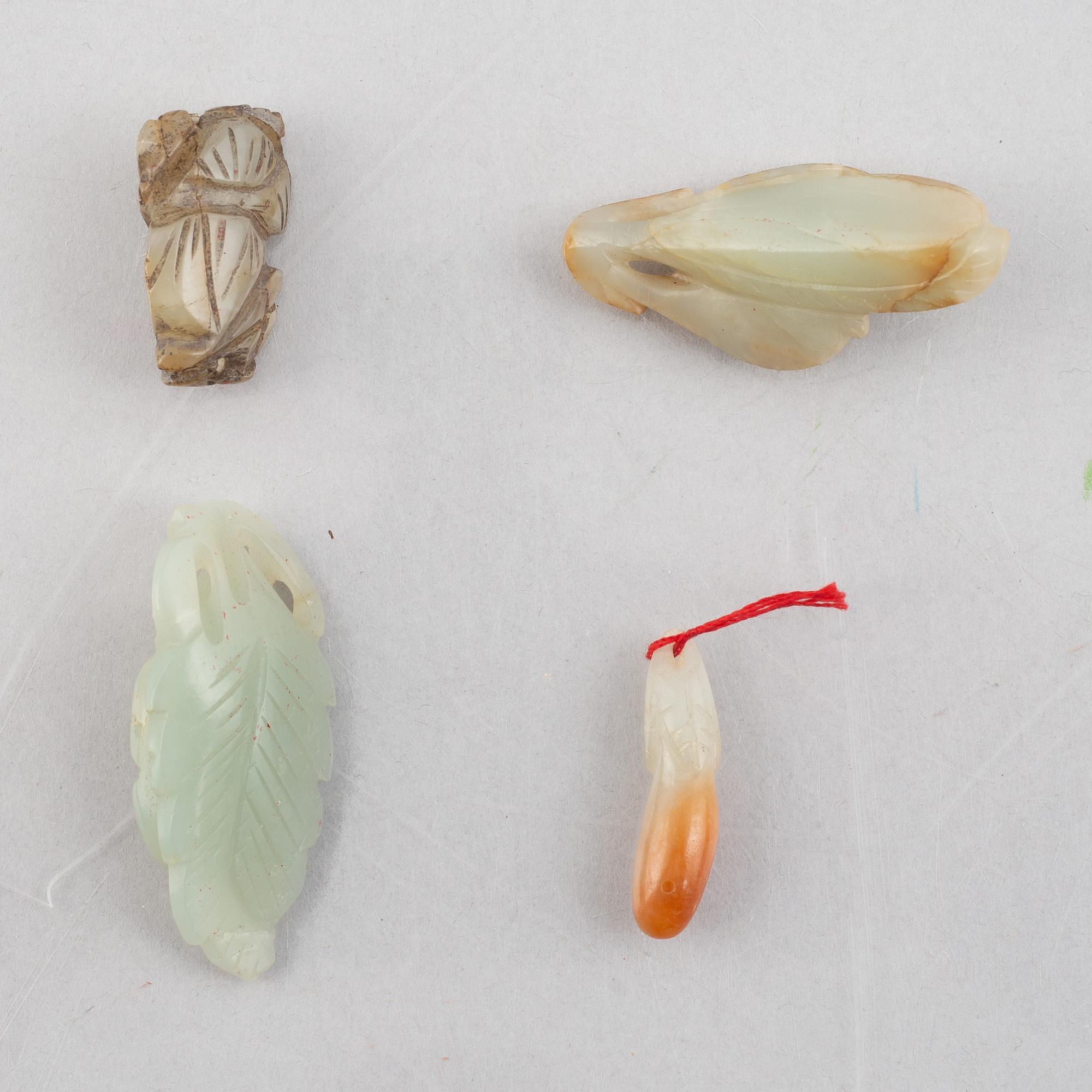 A group of eight Chinese stone charms, 20th century.