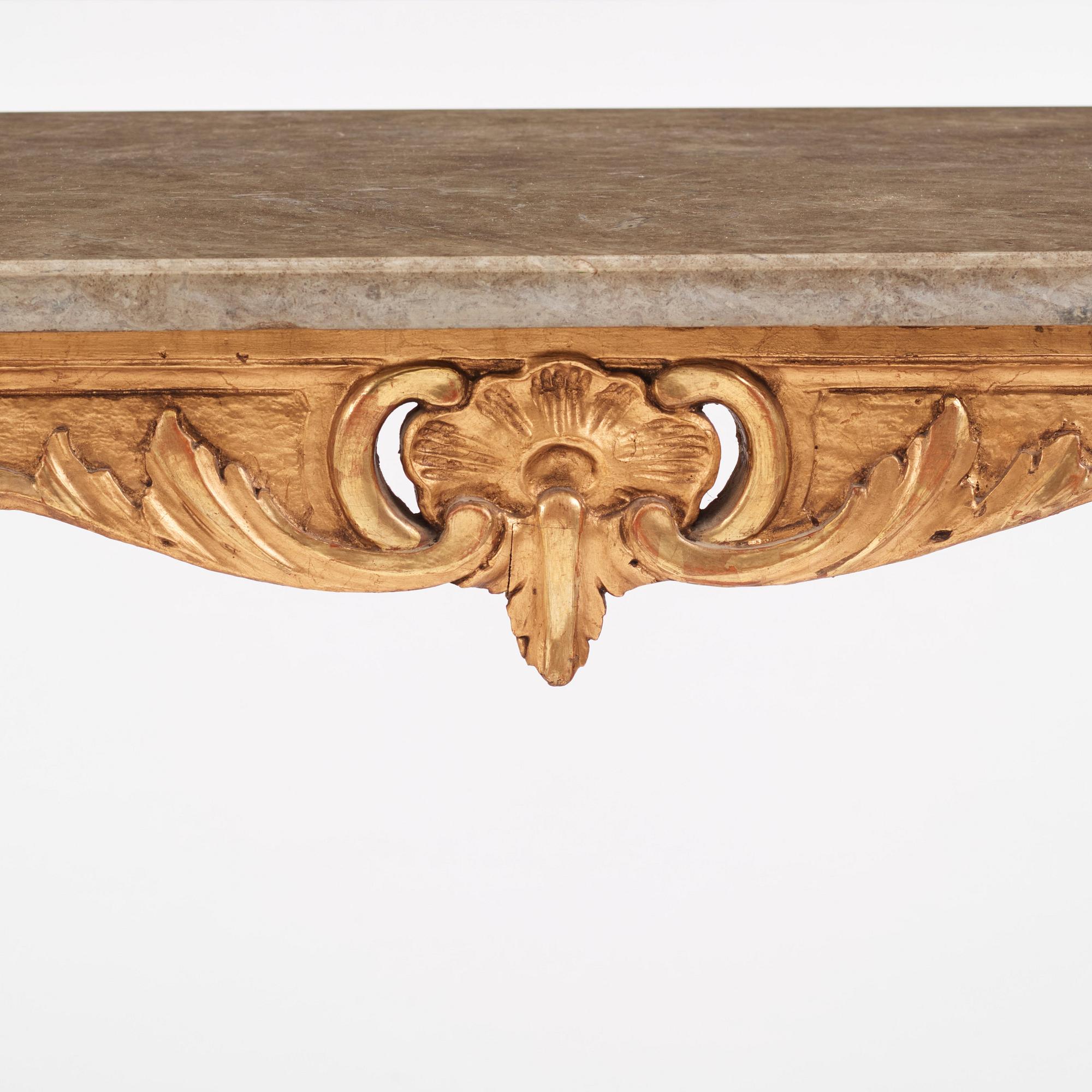 A Swedish rococo-style giltwood table, Stockholm, 19th century.