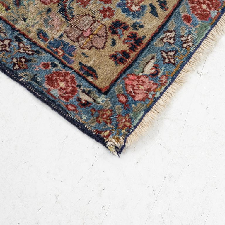 A rug, possibly Tabriz, c. 195 x 137 cm.
