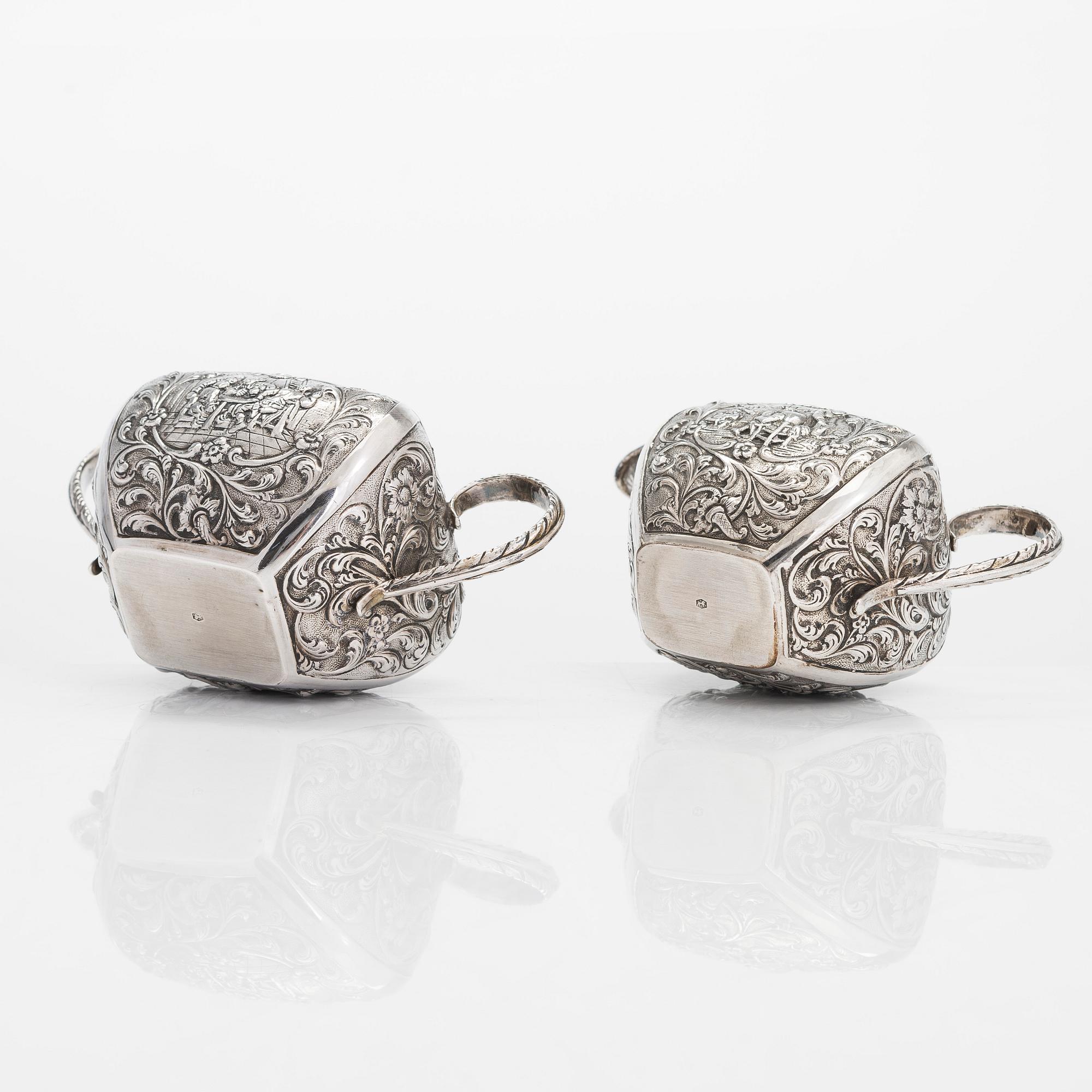 A 1940s Dutch silver sugar bowl and cream jug on a tray, Amsterdam, 1947 and 1942.