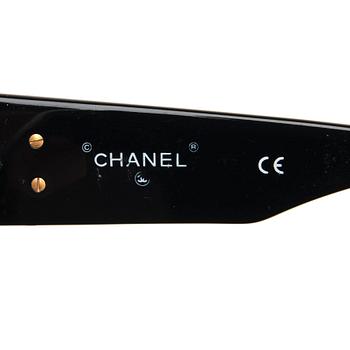 SOLGLASÖGON, Chanel.