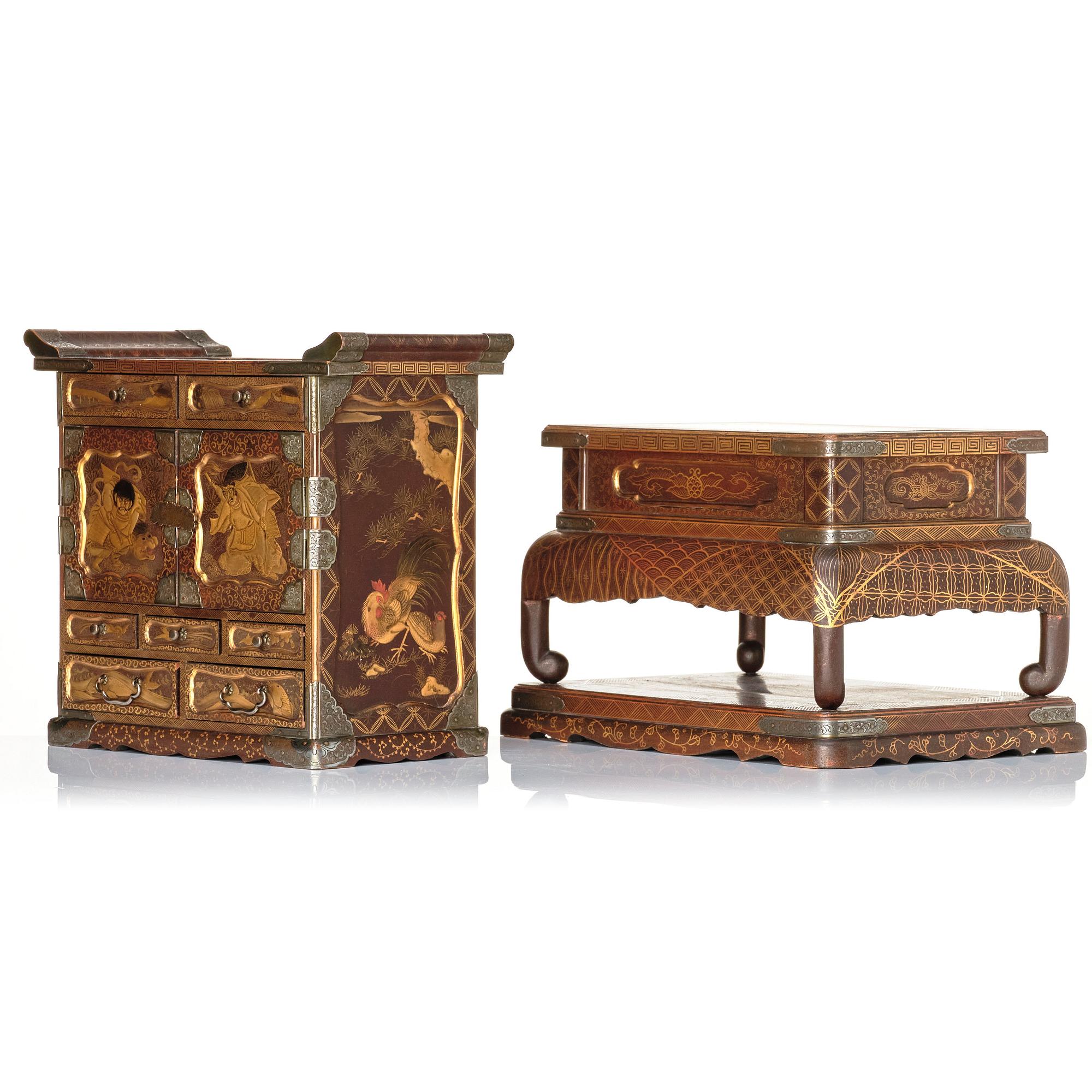A Japanese lacquer cabinet on a stand, Meiji period (1868-1912).