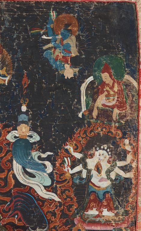A Tibetan Thangka of Mahakala surrounded by fierce Dharma protectors, 19th century.