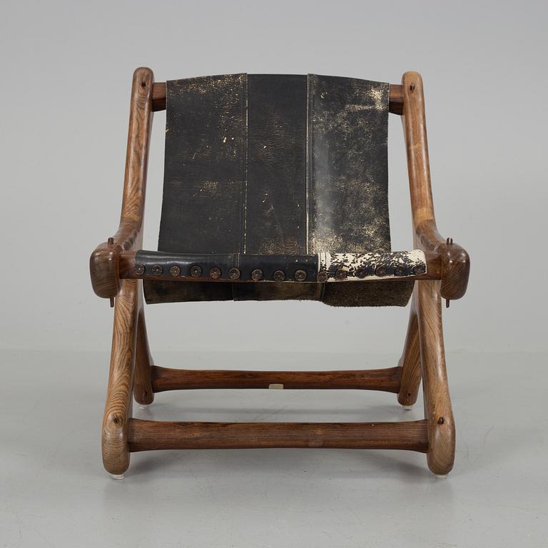 DON SHOEMAKER,  a 'Sloucher' palisander easy chair from Señal S.A.; mexico, 1960's.