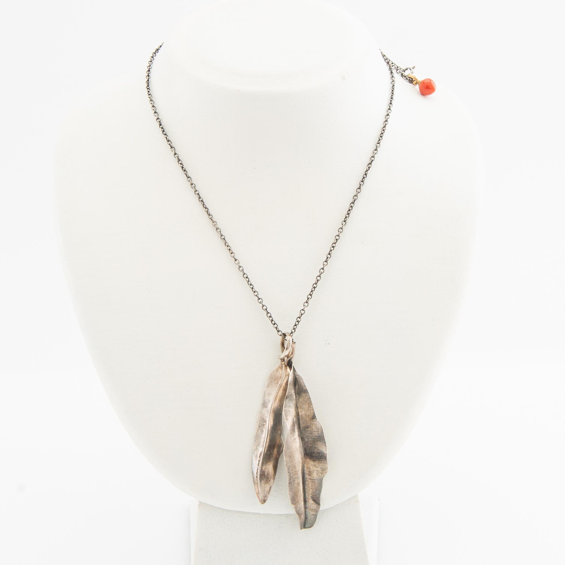 Ole Lynggaard, chain, oxidised silver, with pendants in silver and coral with 18k gold.