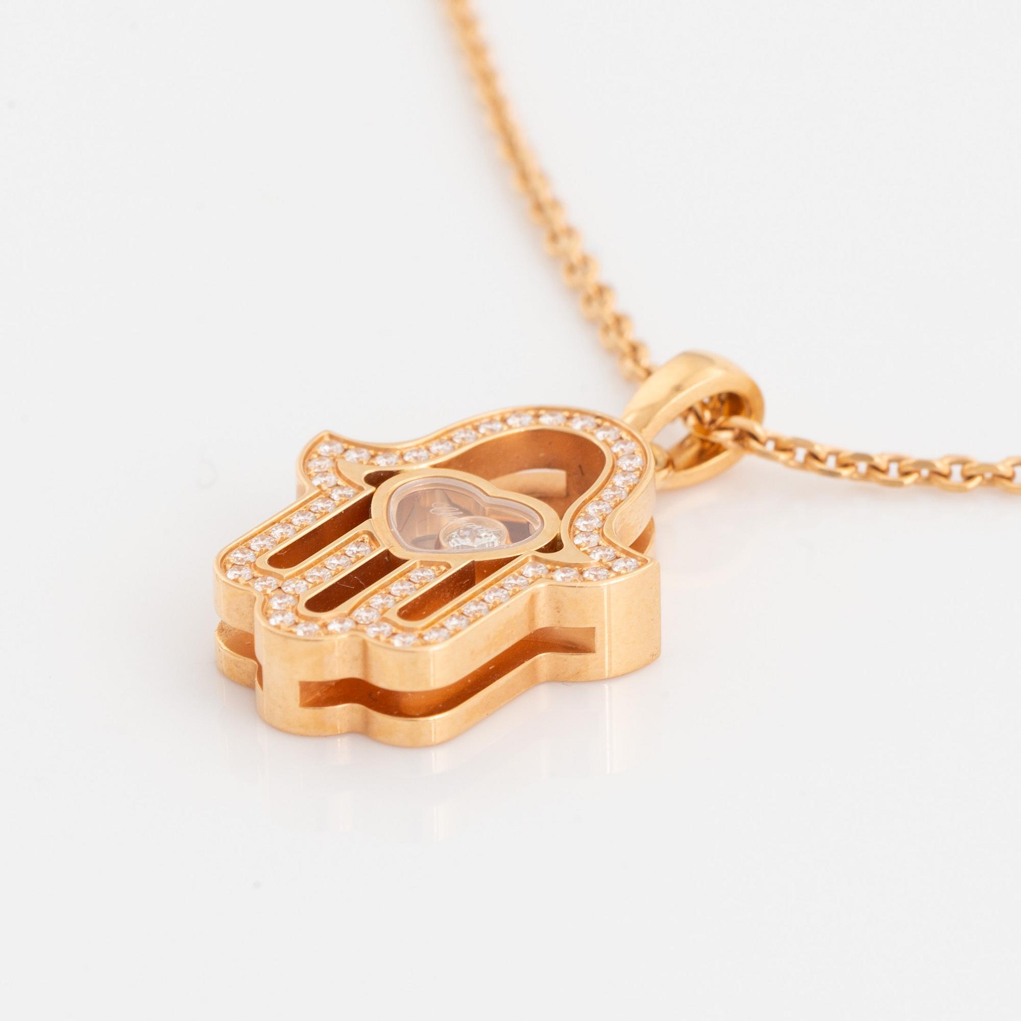 Chopard, Happy diamonds "Fatimas hand" 18K gold and brilliant cut diamond necklace.