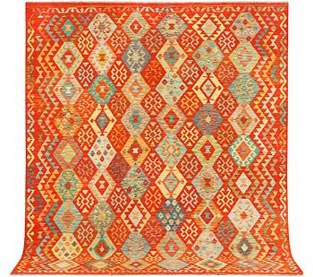 A Kilim carpet, c. 302 x 257 cm.