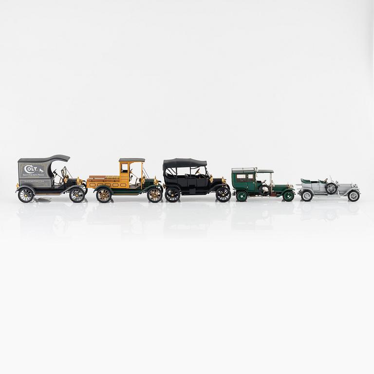 Eight Franklin Mint die cast car models.