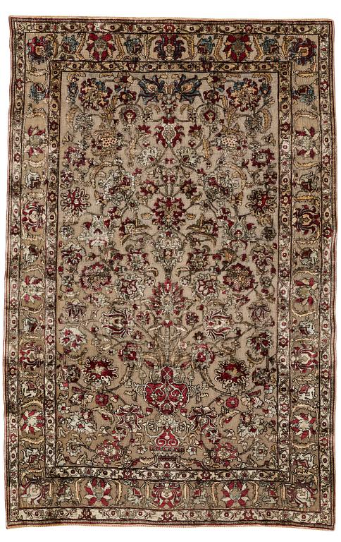 A rug, an antique silk metal brocaded Kashan, probably around 1910, ca 200-202,5 x 129-131 cm.