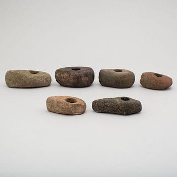 Six neolithic stone axes.