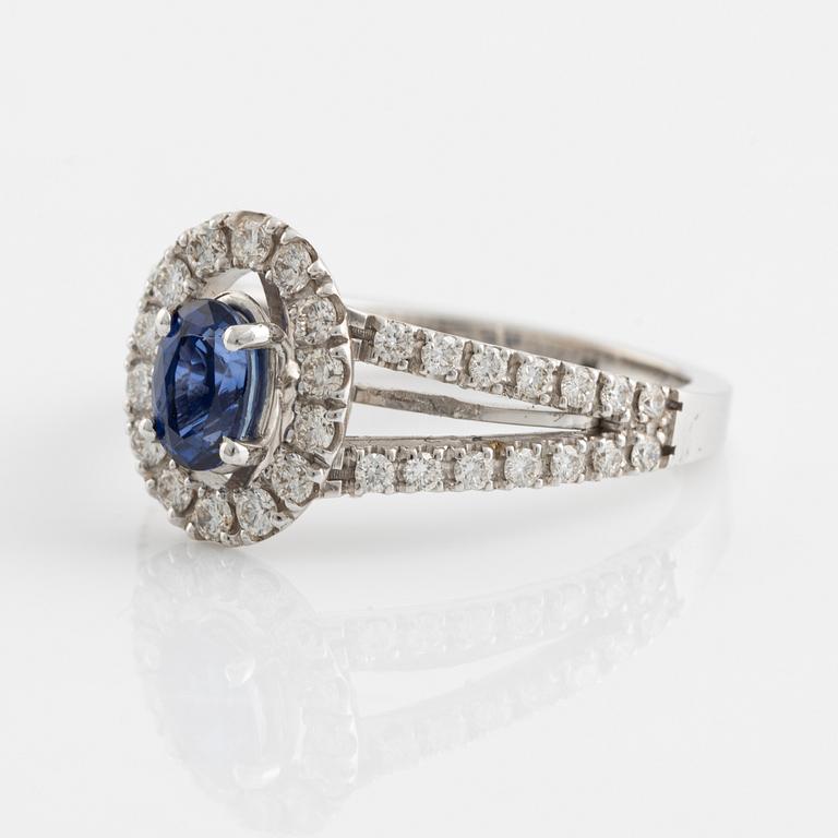 Oval sapphire and brilliant cut diamond ring.