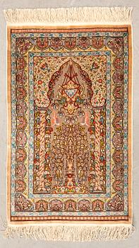 Hereke silk rug with metal thread, semi-antique, approximately 96x62 cm.