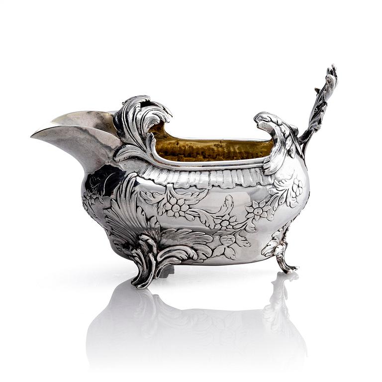 A Swedish Rococo 18th century parcel-gilt silver cream-jug, mark of Johan Abbelin, Gothenburg 1774.
