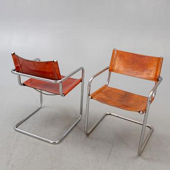 4 late 20th century Italian armchairs.