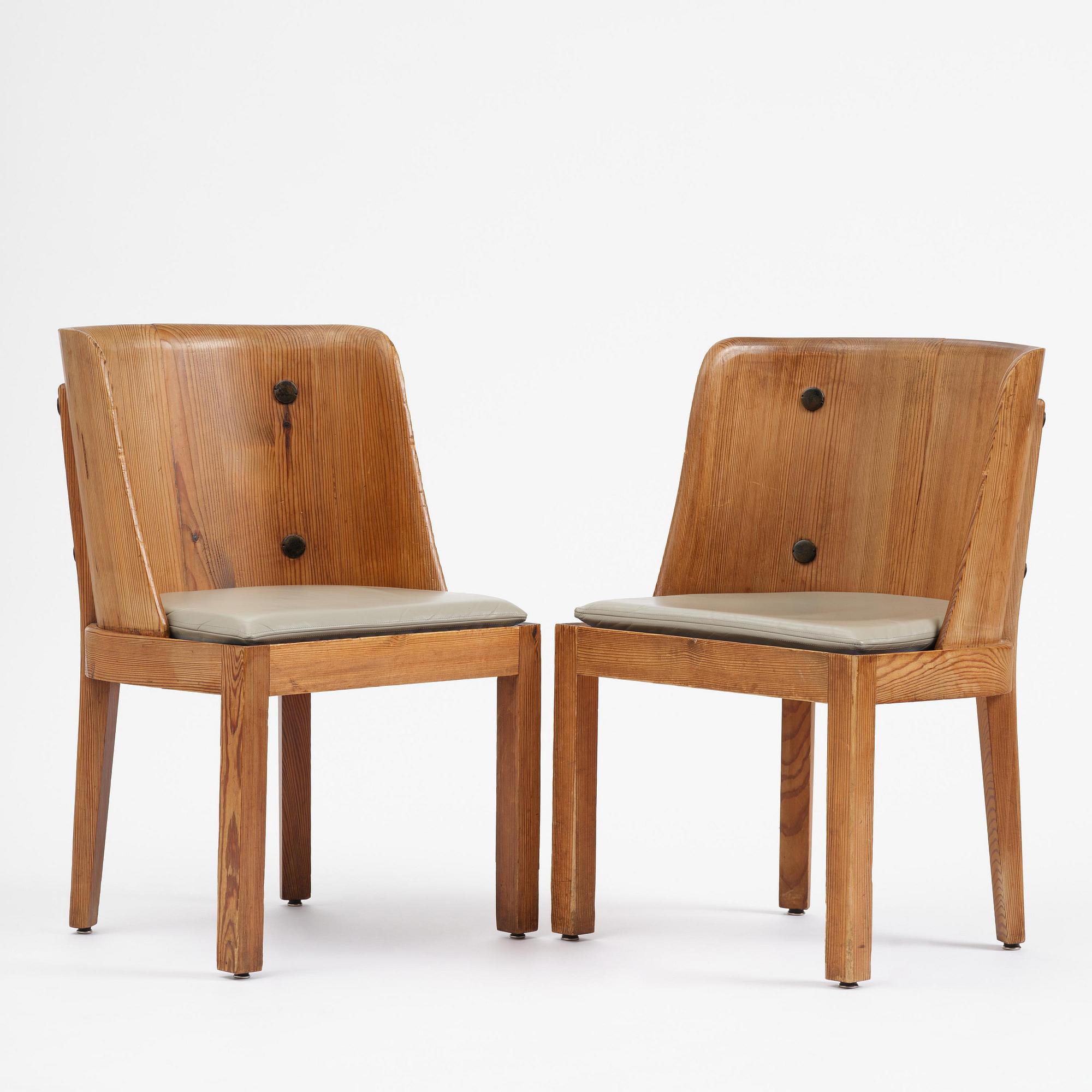 Axel Einar Hjorth, a pair of stained pine "Lovö" armchairs, Nordiska Kompaniet, Sweden, 1930s.