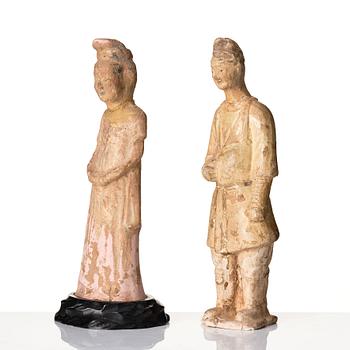 Two yellow glazed pottery figures, Tang/Sui dynasty.