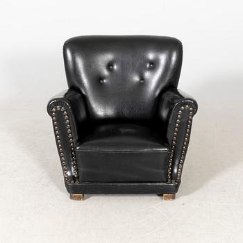 A Danish 1930s leather armchair.