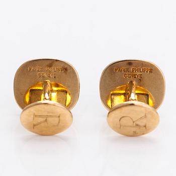 Patek Philippe,  a pair of 18K gold 'Ellipse' cufflinks.