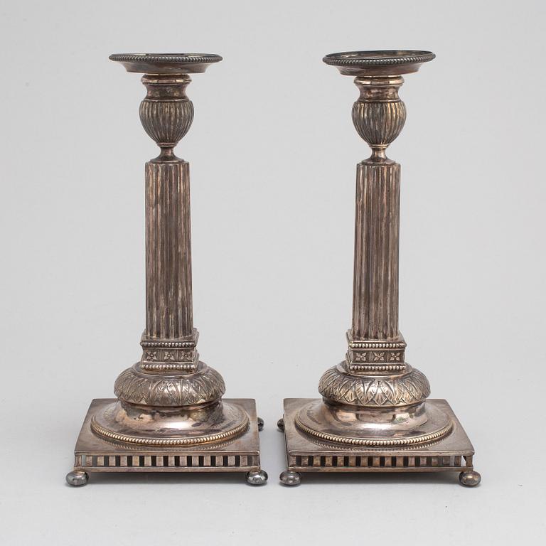 JACOB ENGELBERTH TORSK, a pair of Gustavian style silver candlesticks, Stockholm, 1898.