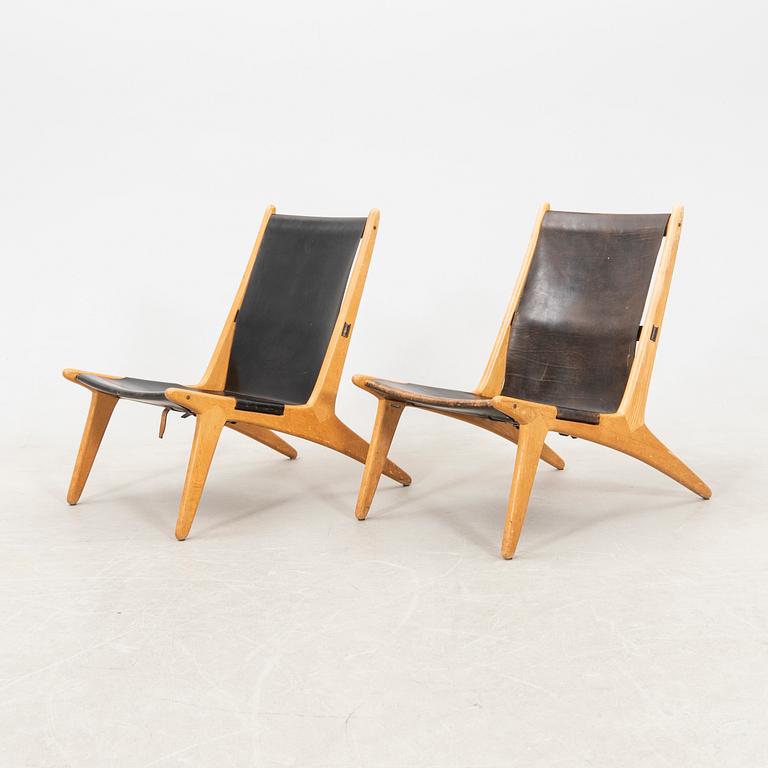 Östen Kristiansson armchairs, a pair of "Jaktstol/Vilstol 204" Luxus, Vittsjö, second half of the 20th century.