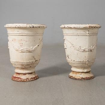 Urnor ett par gjutjärn omkring 1900.