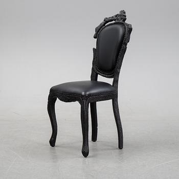 Maarten Baas, a promotional "Smoke dining chair" for Moooi,  after 2002.