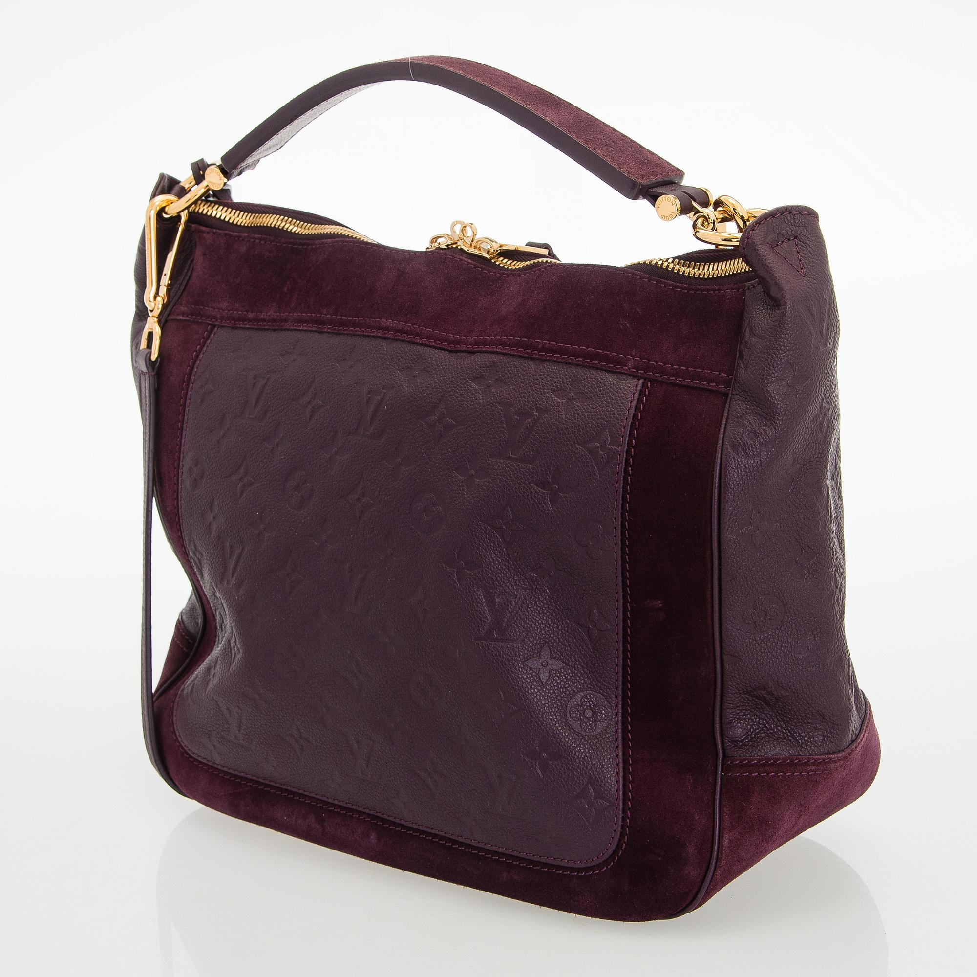 Louis Vuitton, a Monogram Empreinte 'Audacieuse' bag.