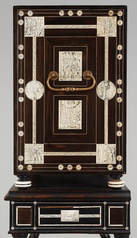 An Italien Baroque-style 19th century cabinet on stand.