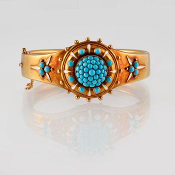 ARMBAND, 14K guld med turkoser och vit emalj. Vikt 28,8 gram.