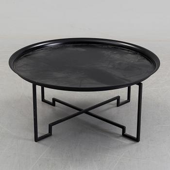 A coffee table designed in 2000 by Per Öberg for Svensk Tenn.