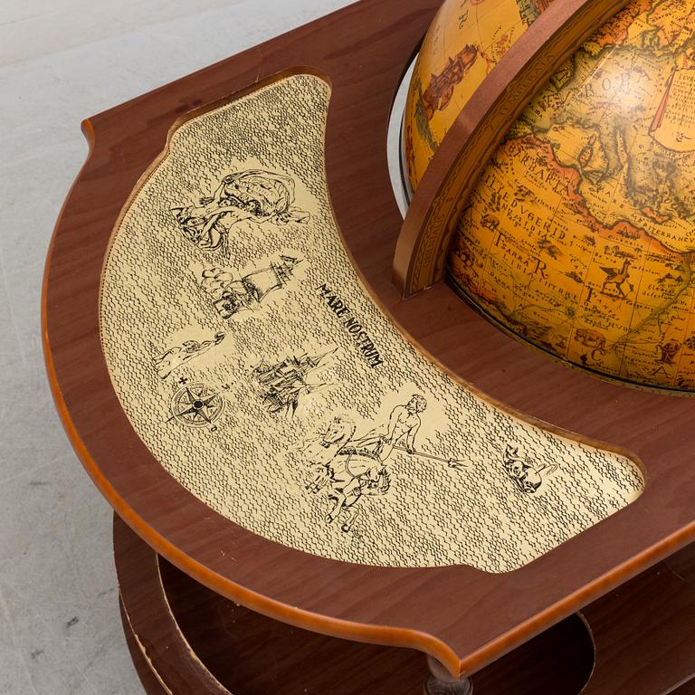 A globe shaped drinks cabinet, circa 2000.